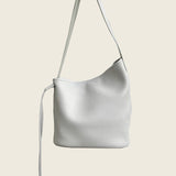 Minimalist top-grain cowhide bucket bag