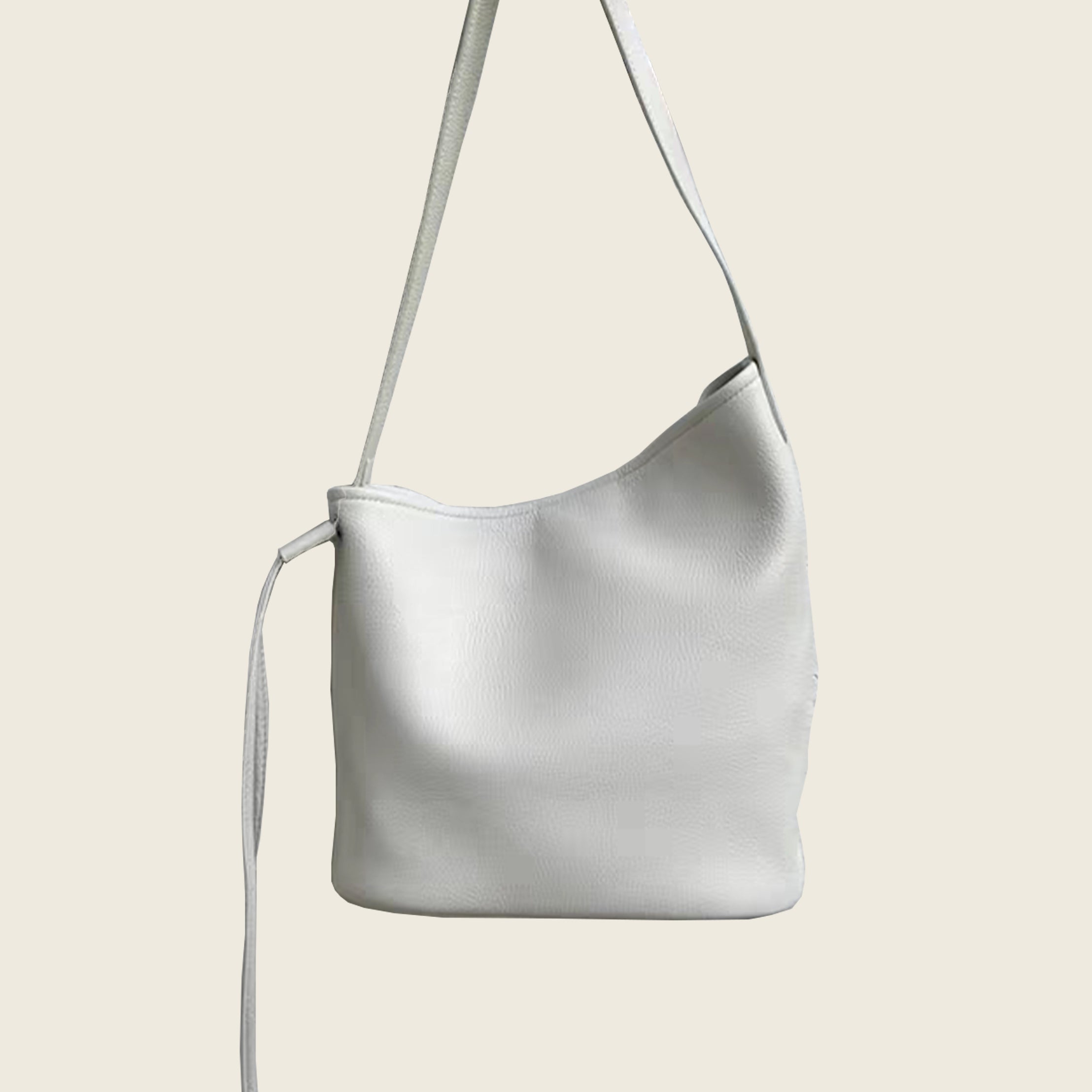 Minimalist top-grain cowhide bucket bag