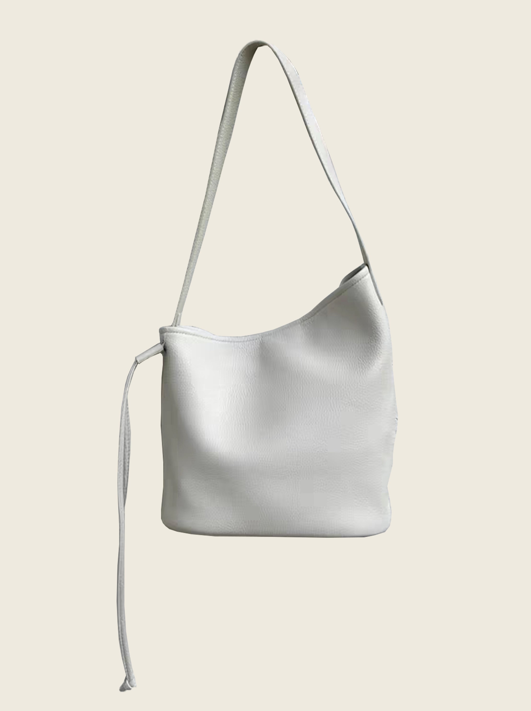 Minimalist top-grain cowhide bucket bag